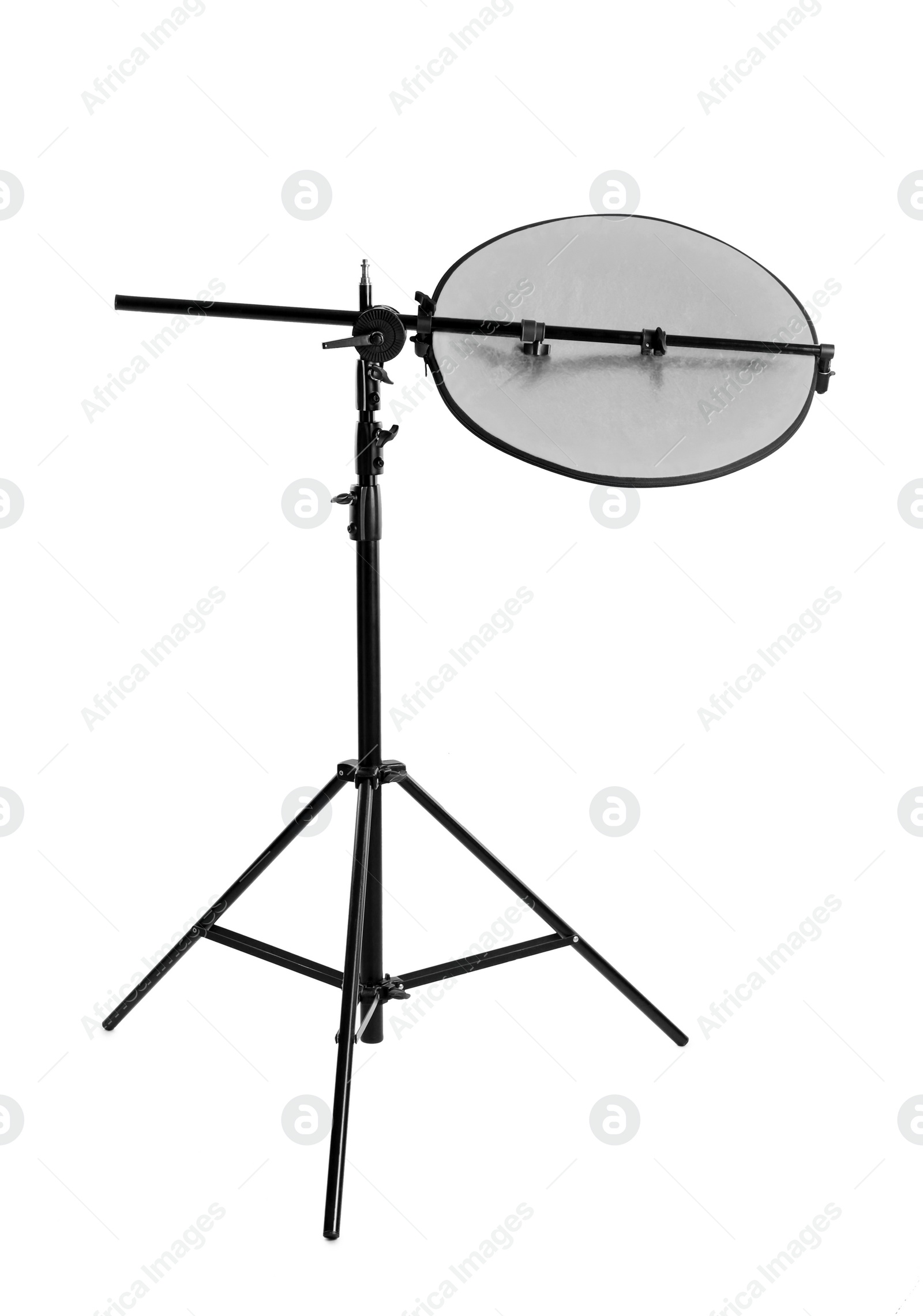 Photo of Tripod with studio reflector isolated on white. Professional photographer's equipment