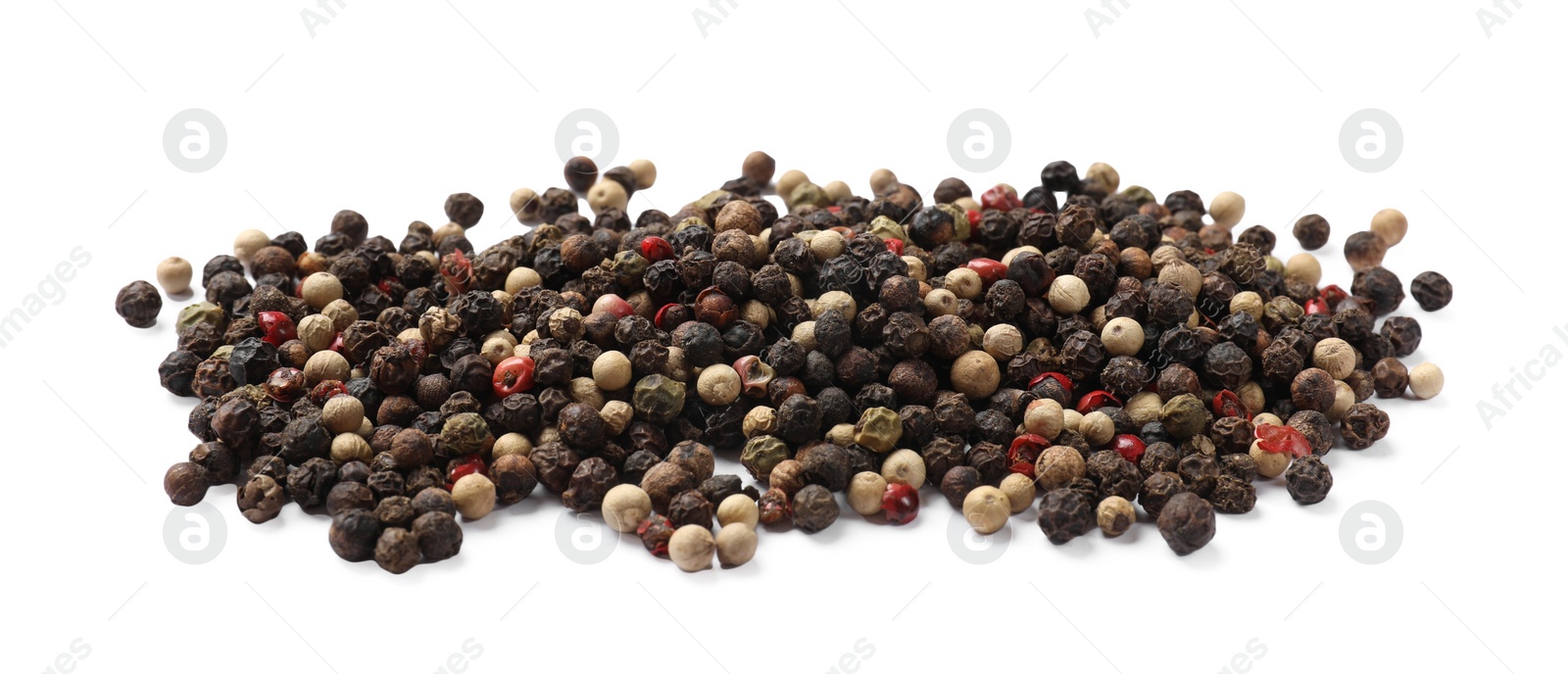 Photo of Aromatic spices. Pile of different peppers isolated on white