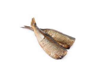 Photo of Two tasty smoked sprats isolated on white