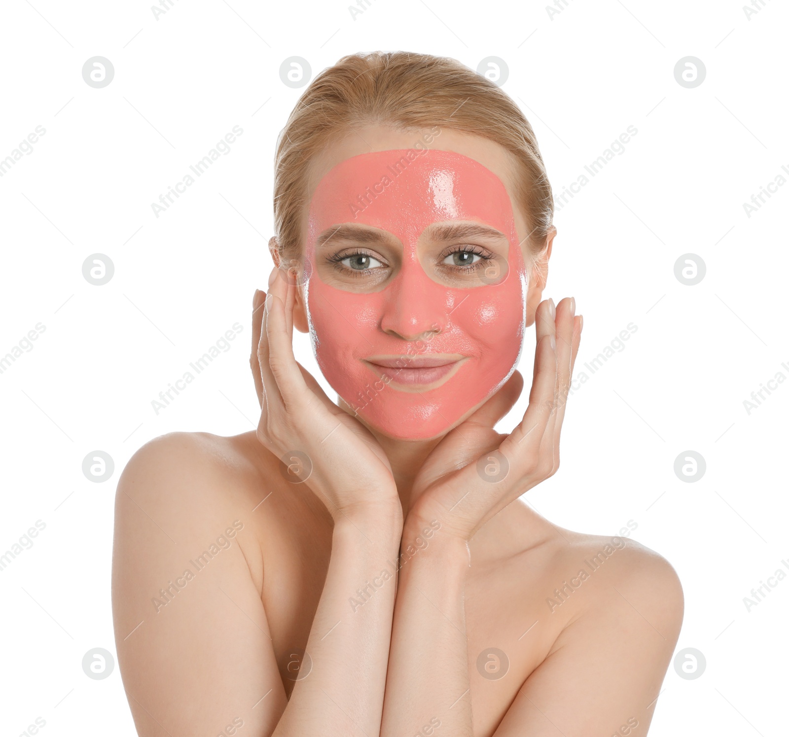 Photo of Young woman with pomegranate face mask on white background