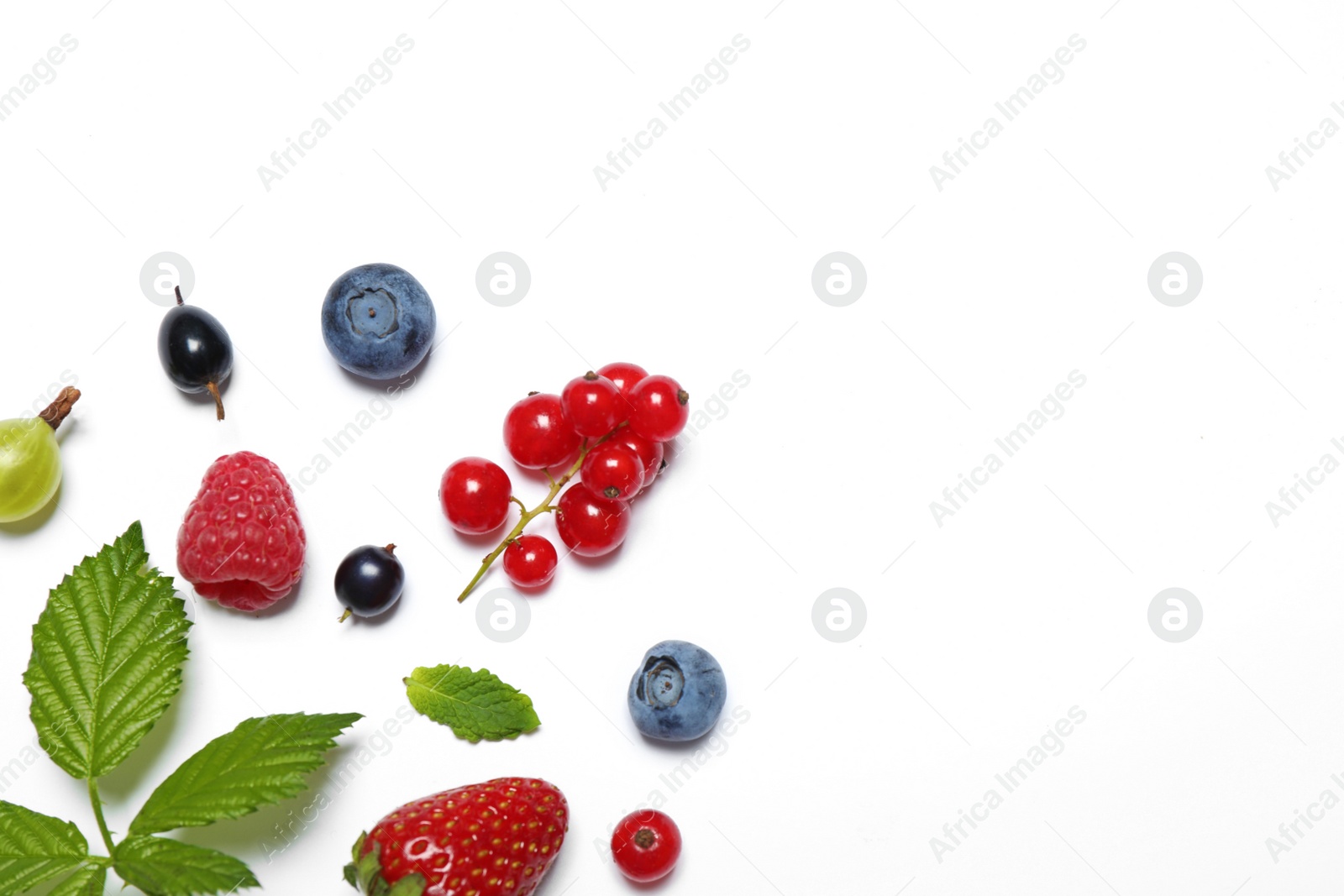 Photo of Mix of fresh berries on white background, flat lay. Space for text