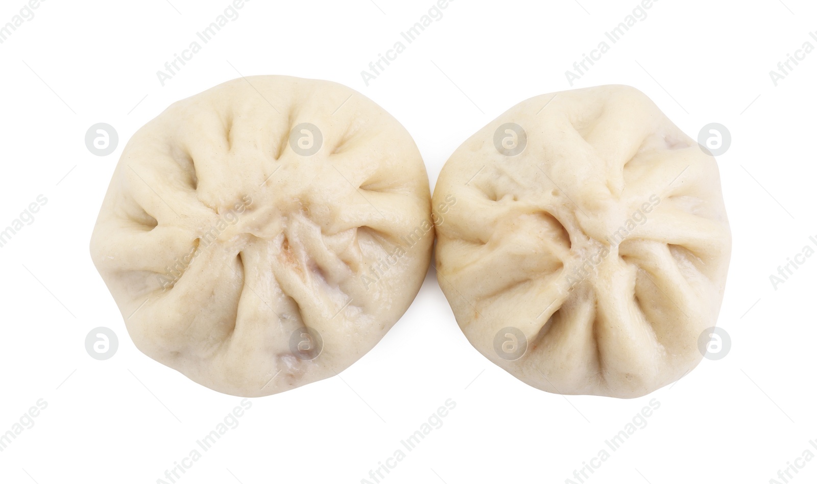 Photo of Delicious bao buns (baozi) isolated on white, top view