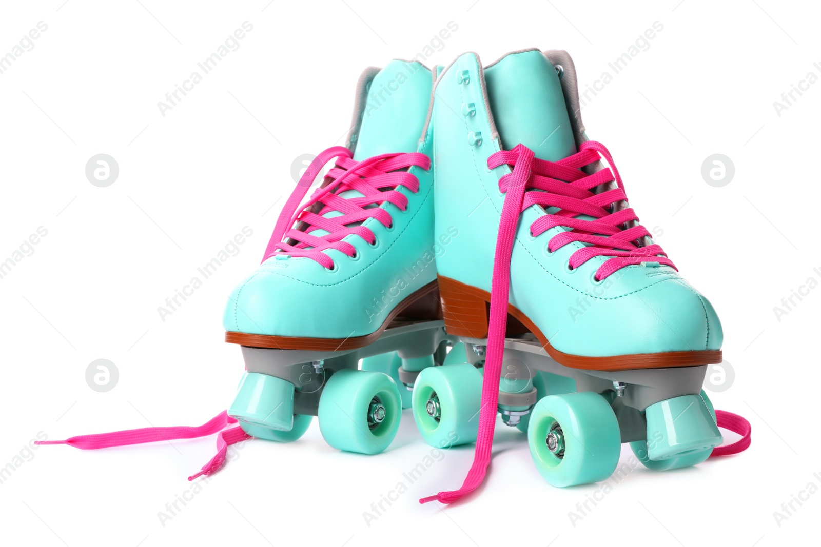 Photo of Pair of bright stylish roller skates on white background