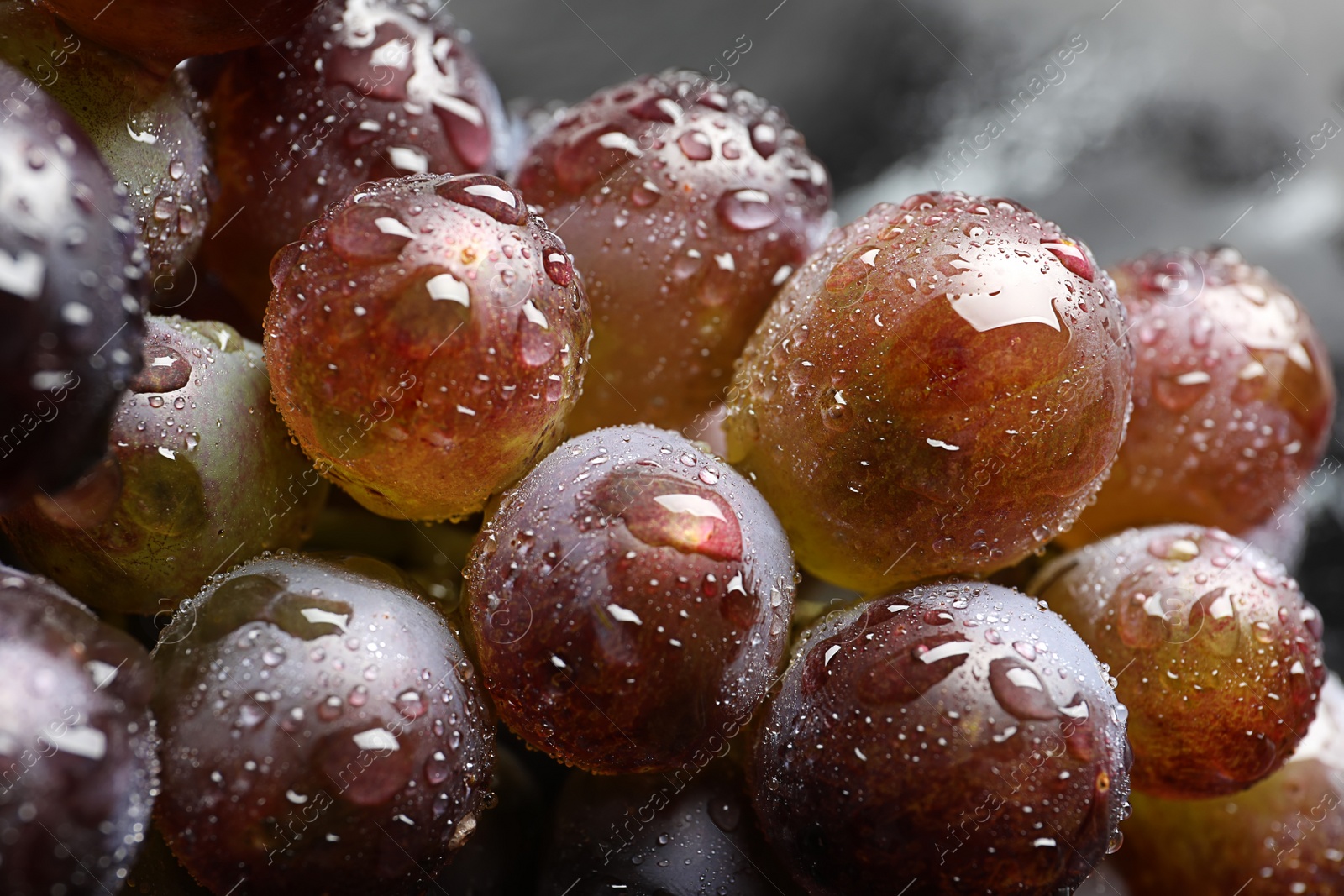 Photo of Bunch of fresh ripe juicy grapes as background, closeup