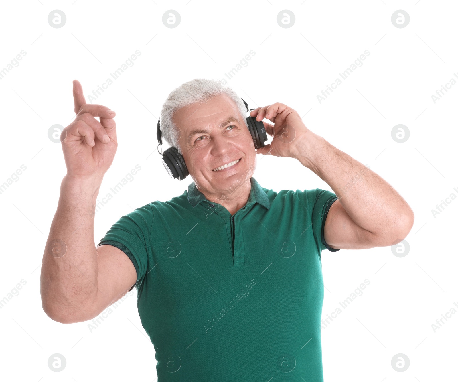 Photo of Mature man enjoying music in headphones on white background