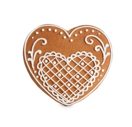Photo of Gingerbread heart decorated with icing isolated on white