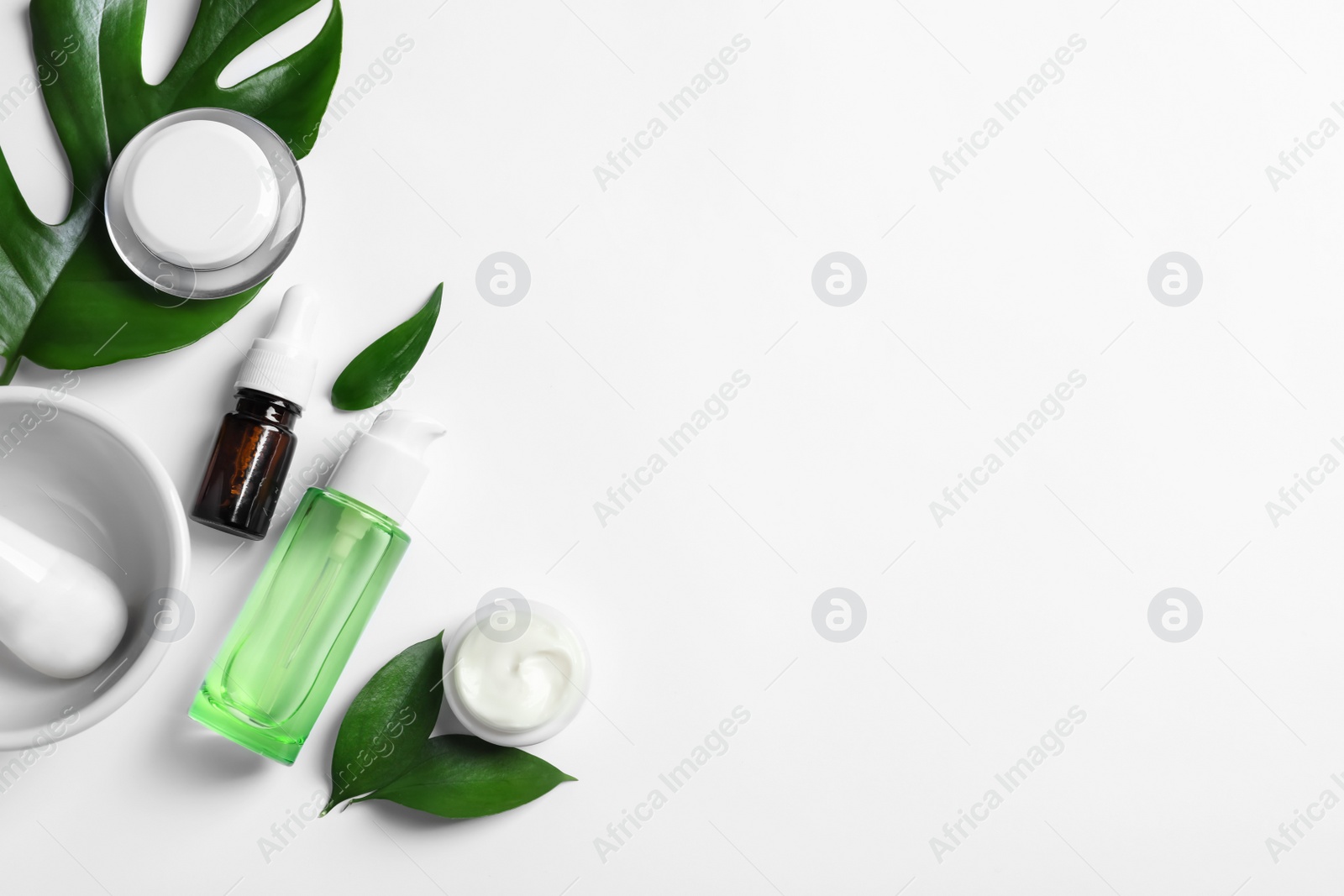 Photo of Flat lay composition with cosmetic products on white background