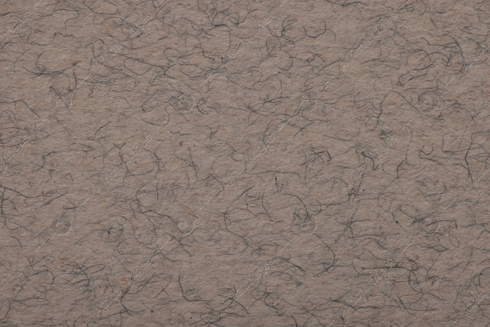 Photo of Texture of grey paper sheet as background, top view