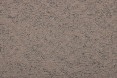 Texture of grey paper sheet as background, top view