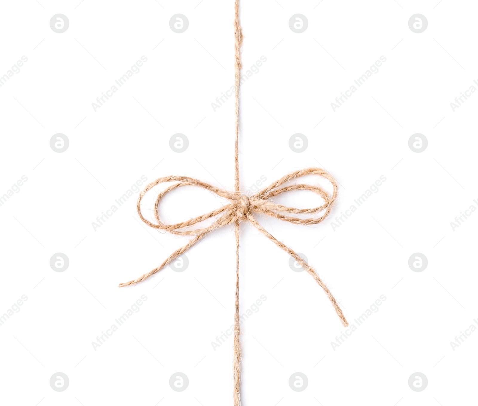 Photo of Linen rope string with bow isolated on white, top view