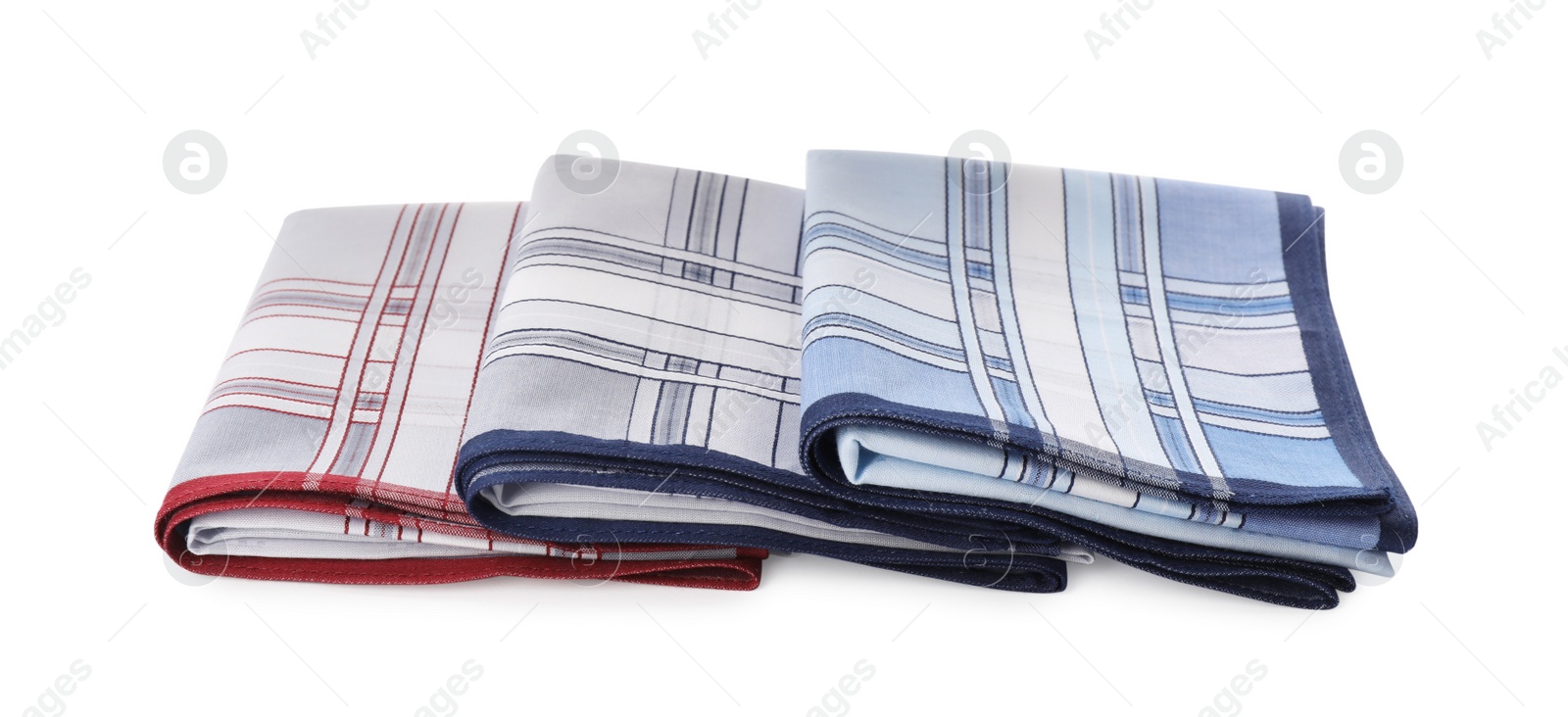 Photo of Folded handkerchiefs on white background. Stylish accessory