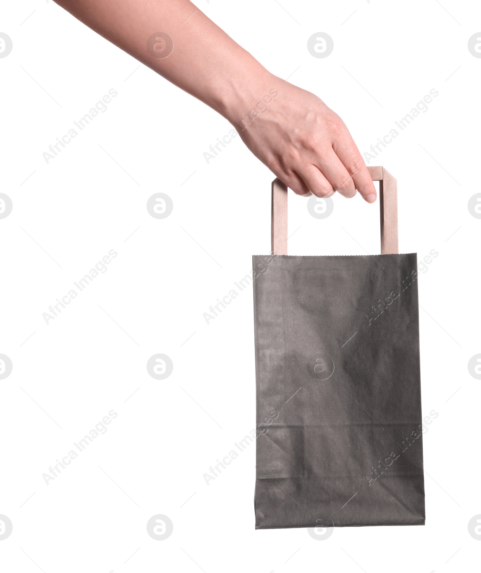 Photo of Woman holding paper shopping bag on white background, closeup