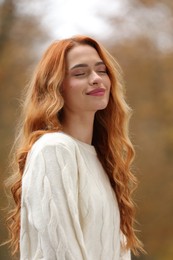 Photo of Autumn vibes. Portrait of beautiful woman outdoors