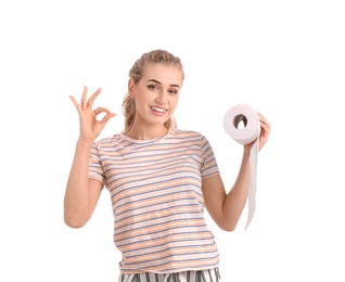 Photo of Beautiful young woman holding toilet paper roll on white background