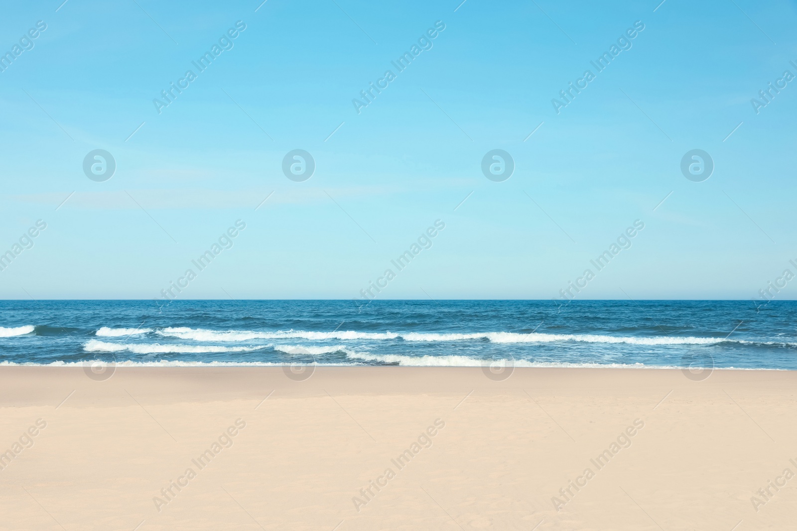 Photo of Picturesque view of beautiful sea and sandy beach on sunny day