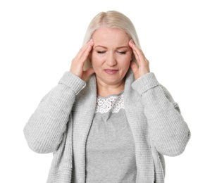 Mature woman suffering from headache on white background