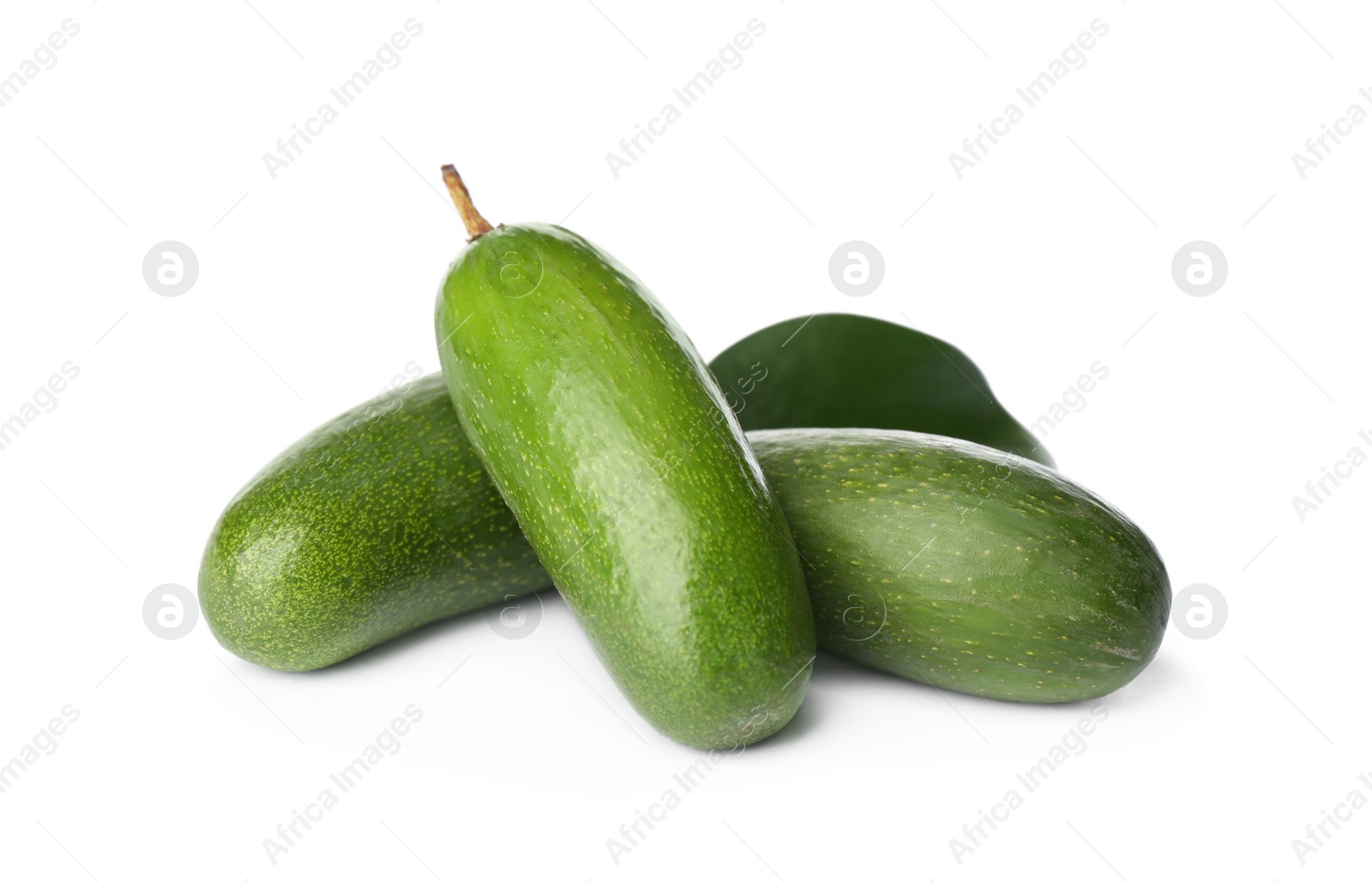 Photo of Fresh whole seedless avocados with leaf isolated on white