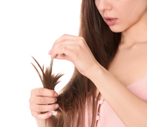Photo of Woman with damaged hair on white background, closeup. Split ends