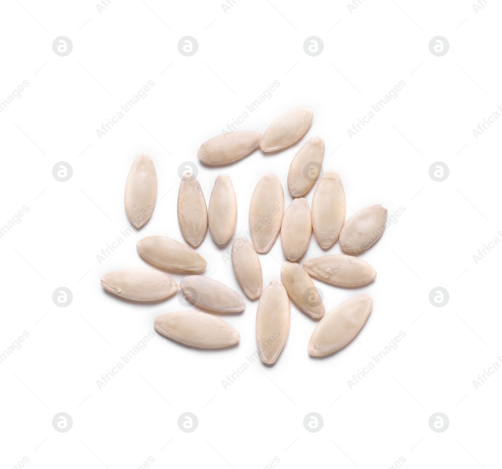 Photo of Pile of cucumber seeds on white background, top view