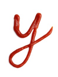 Photo of Letter Y written with ketchup on white background