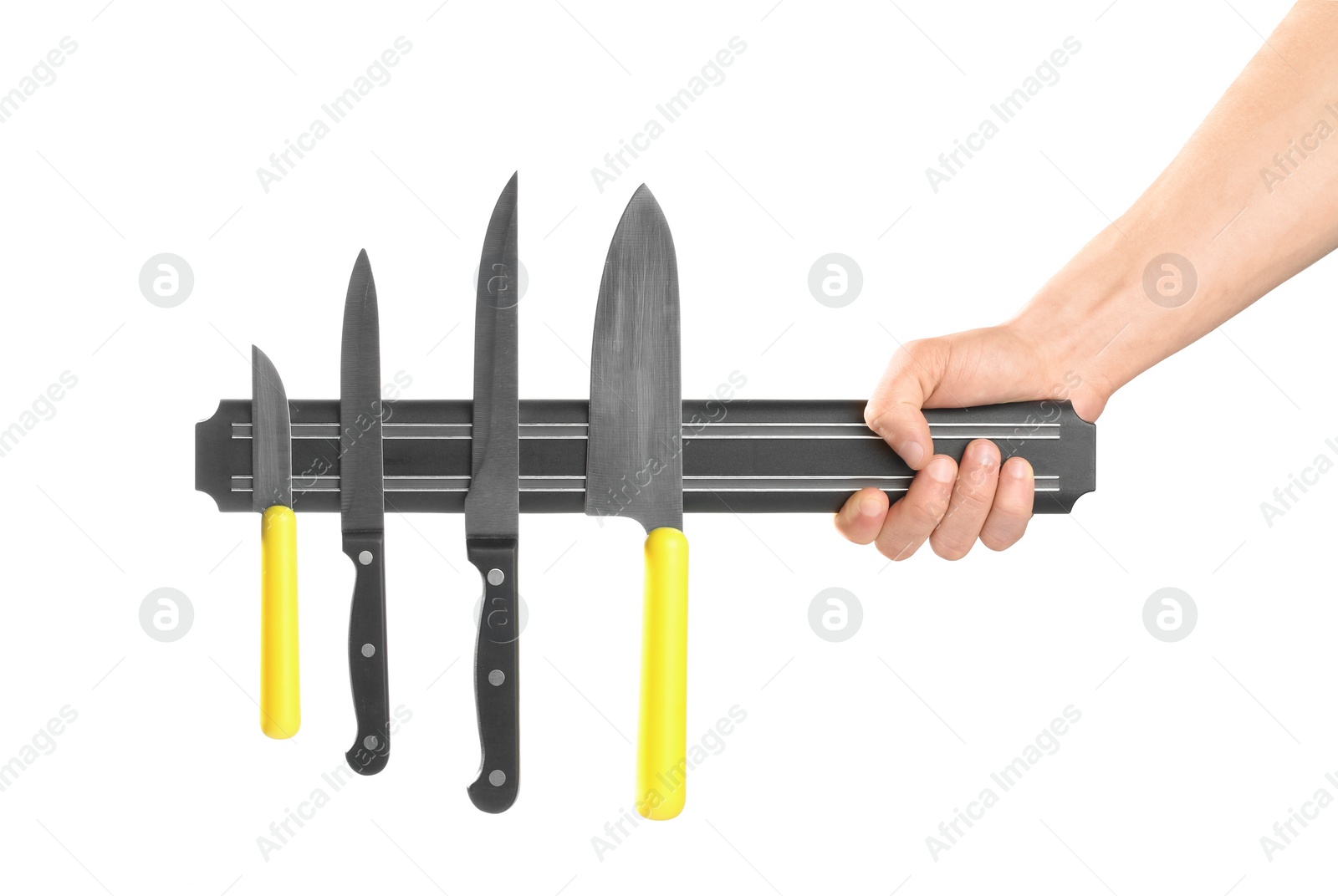 Photo of Man with magnetic holder and different knives isolated on white, closeup