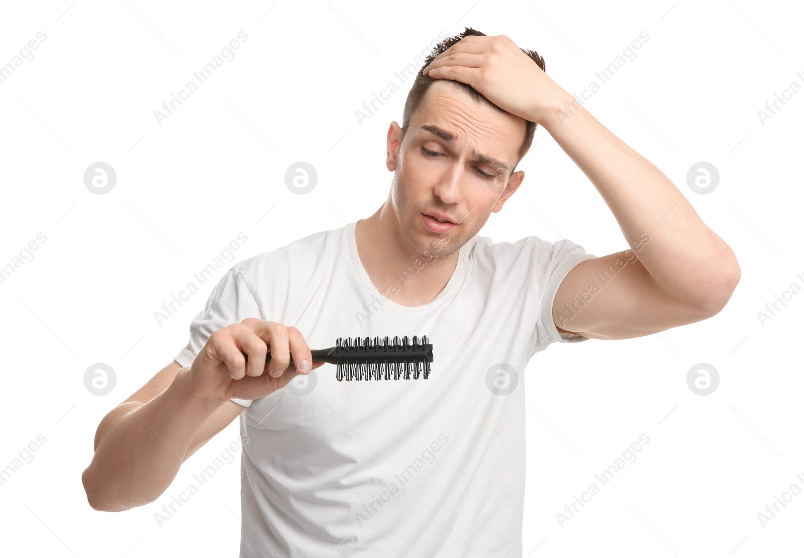 Photo of Young man with hair loss problem on white background