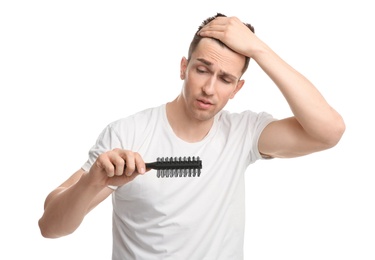 Photo of Young man with hair loss problem on white background