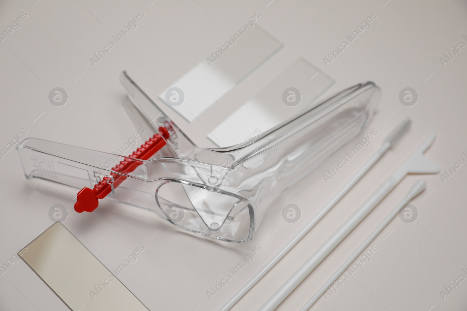 Photo of Sterile gynecological examination kit on beige background