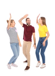 Photo of Young people celebrating victory on white background