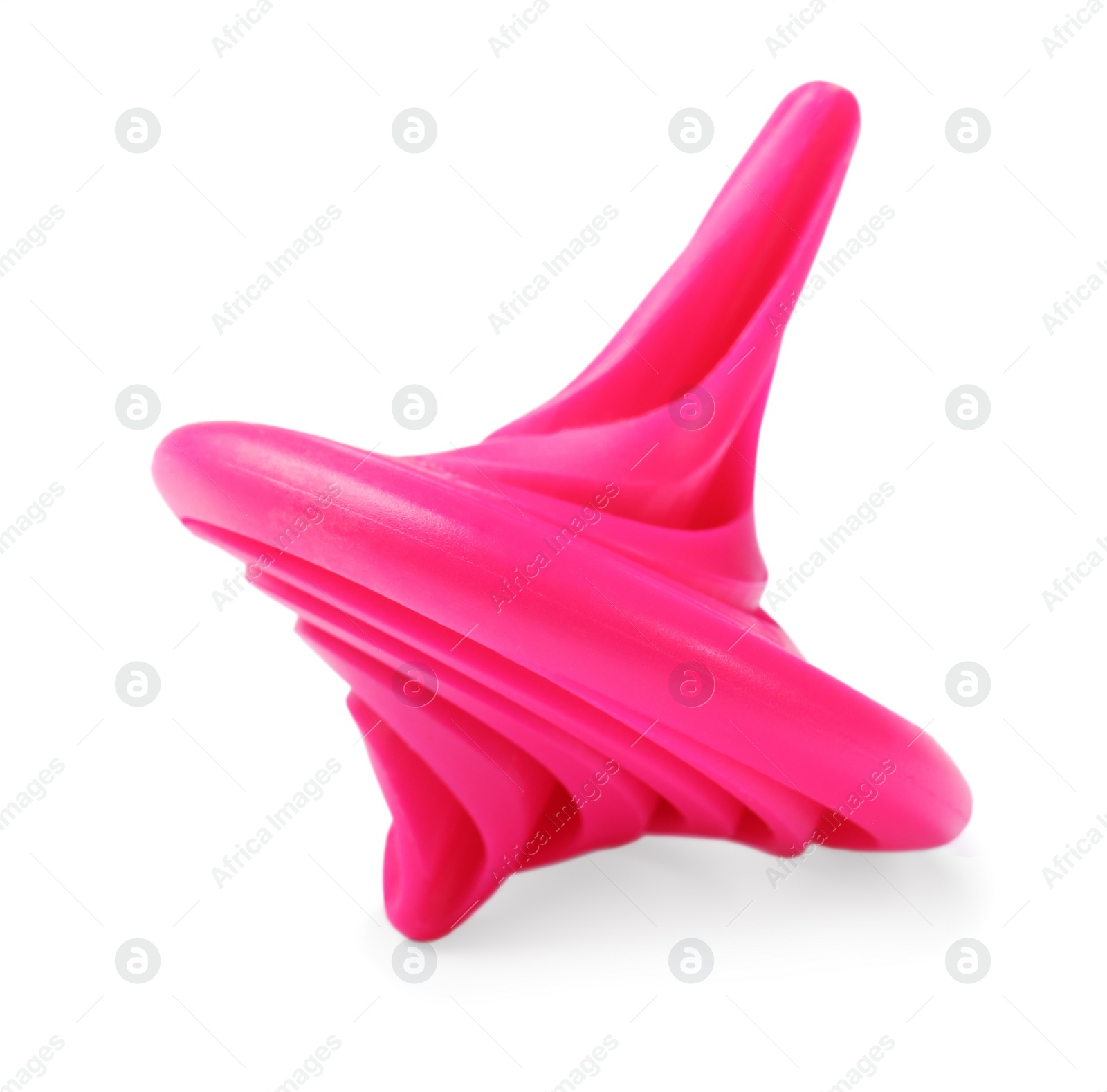 Photo of One pink spinning top isolated on white