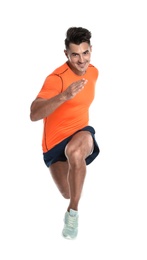 Photo of Handsome young man running on white background