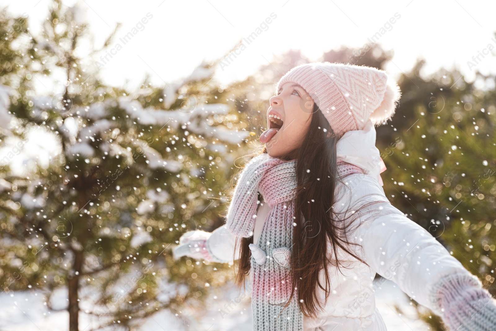 Photo of Cute little girl outdoors on winter day. Christmas vacation