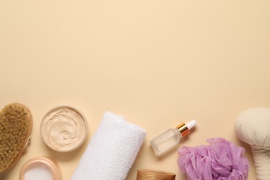 Bath accessories. Flat lay composition with personal care products on beige background, space for text