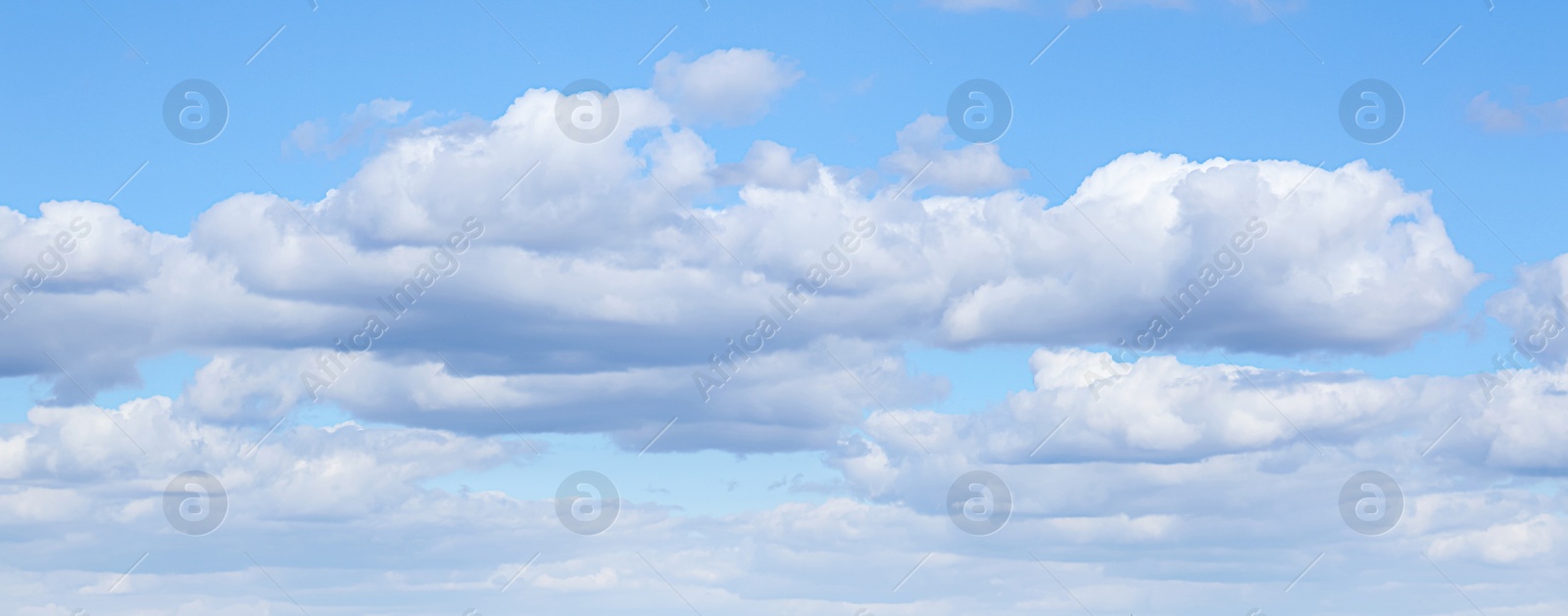 Image of Picturesque view of beautiful blue sky with fluffy clouds on sunny day, banner design