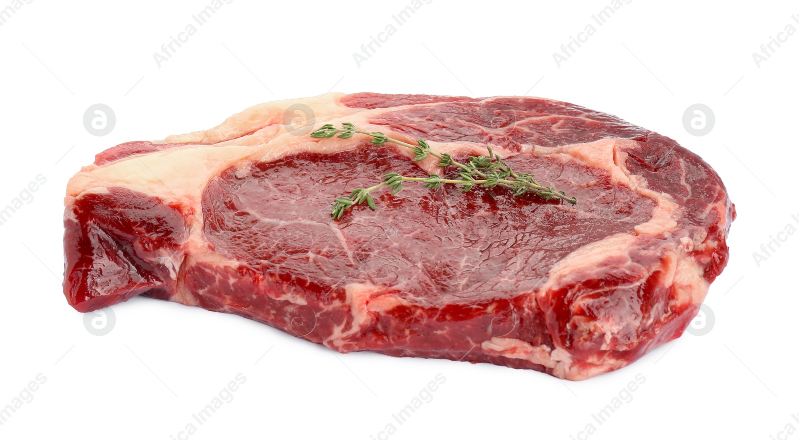 Photo of Piece of fresh beef meat and thyme isolated on white