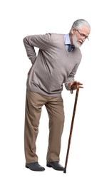 Tired senior man with walking cane on white background