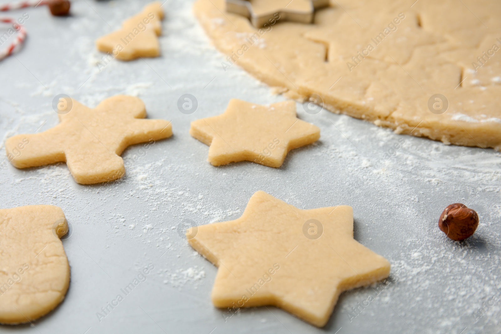 Photo of Raw Christmas cookies on table. Festive treats