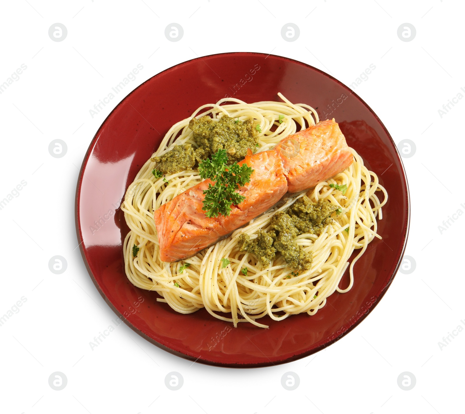 Photo of Delicious spaghetti with salmon and pesto sauce on white background, top view