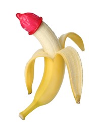 Banana with condom isolated on white. Safe sex concept