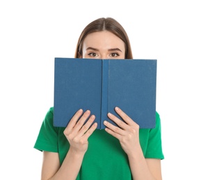 Photo of Young woman hiding behind book on white background. Reading activity