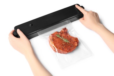 Photo of Woman using sealer for vacuum packing and plastic bag with meat steak, rosemary on white background, closeup