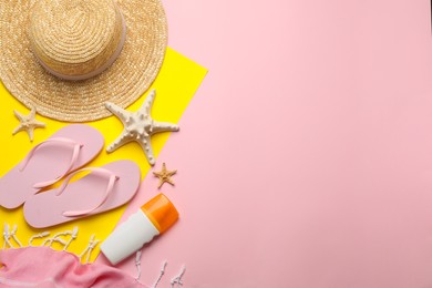 Flat lay composition with different beach objects on color background, space for text