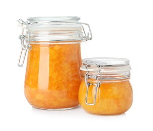 Photo of Jars of apricot jam isolated on white