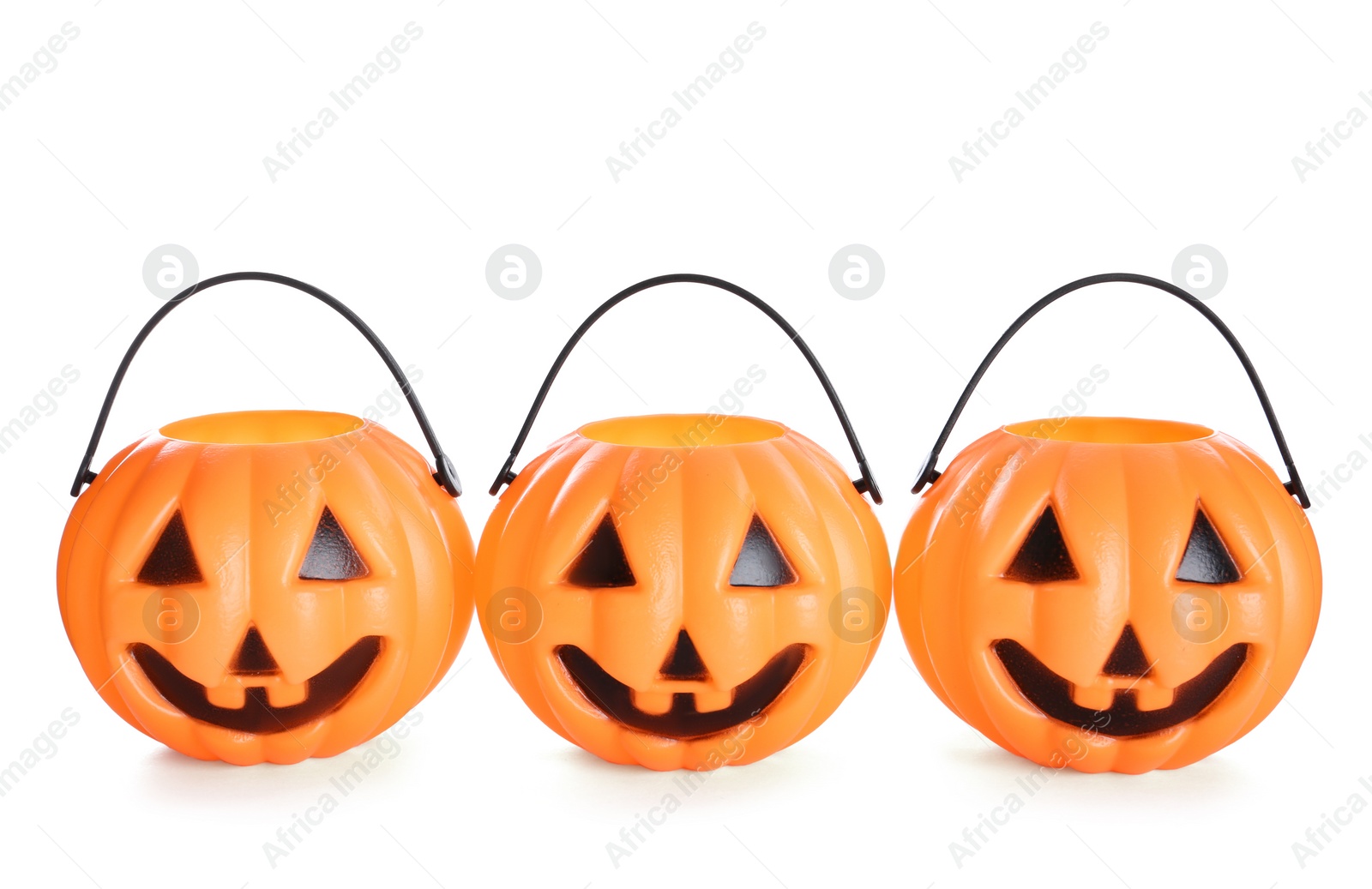 Photo of Halloween trick or treat buckets isolated on white