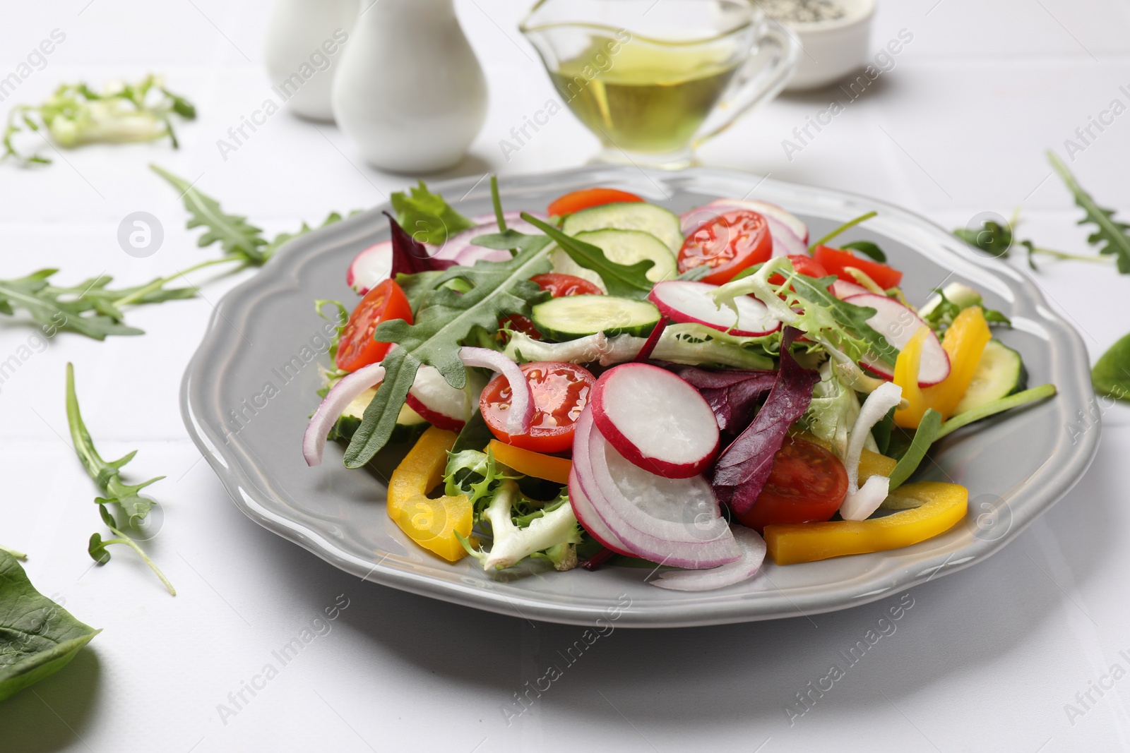 Photo of Balanced diet and vegetarian foods. Plate with different delicious products on white table, closeup