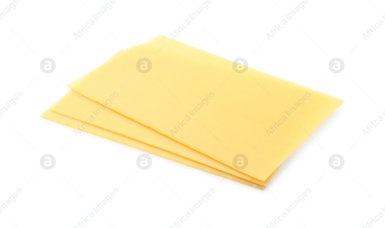 Photo of Stack of uncooked lasagna sheets isolated on white