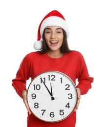 Photo of Woman in Santa hat with clock on white background. New Year countdown