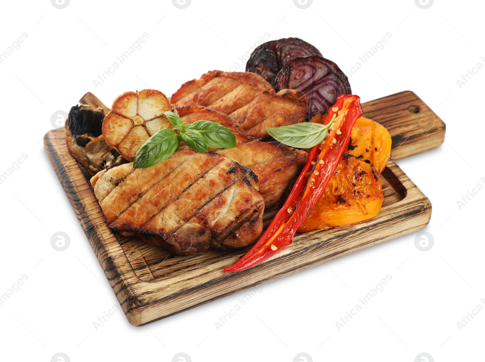 Photo of Wooden board with tasty grilled vegetables, meat and basil isolated on white