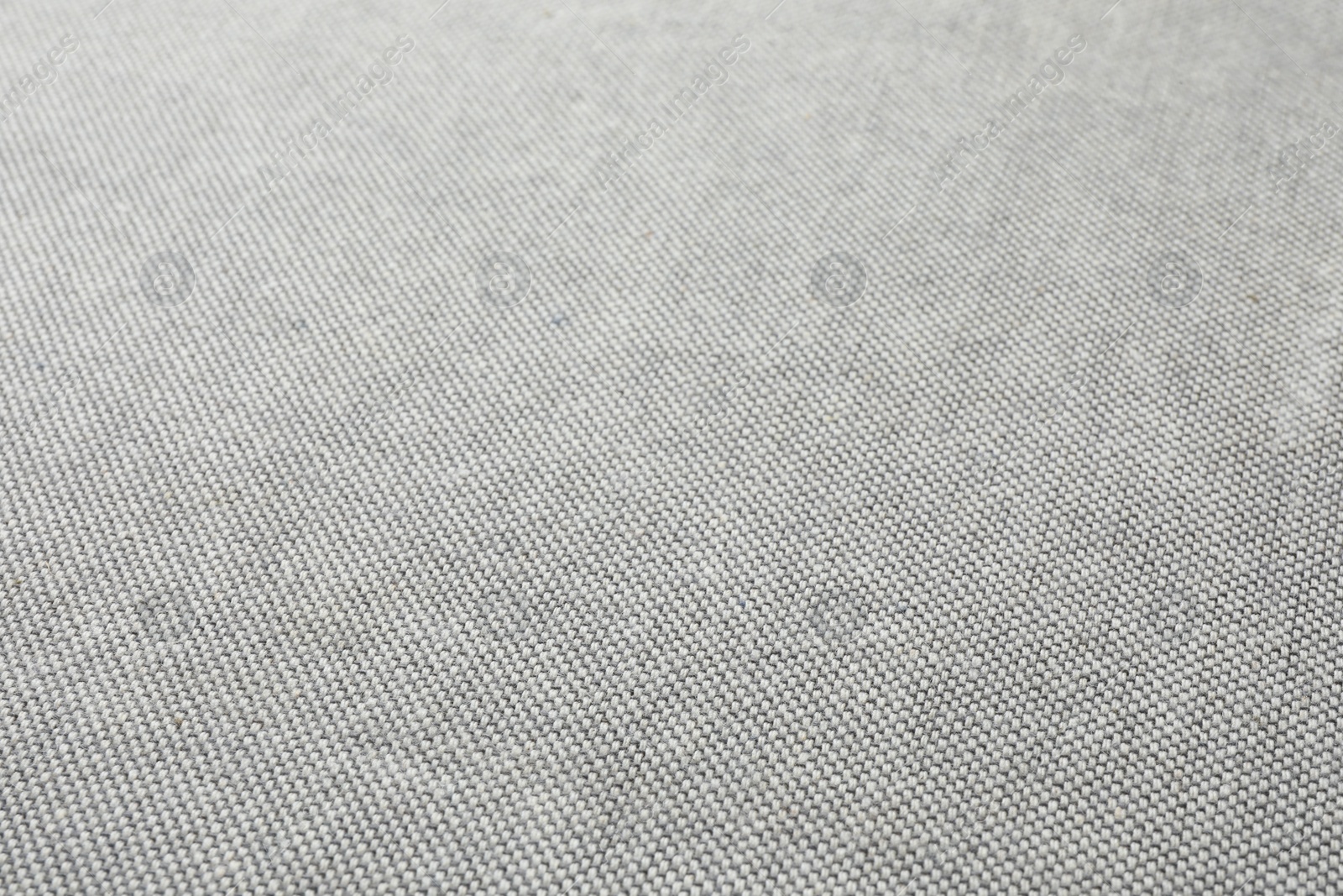 Photo of Texture of grey fabric as background, closeup