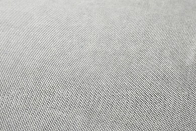 Photo of Texture of grey fabric as background, closeup